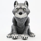 3D printed gray wolf sensory toy with movable joints, sitting on a white background