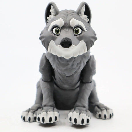 3D printed gray wolf sensory toy with movable joints, sitting on a white background
