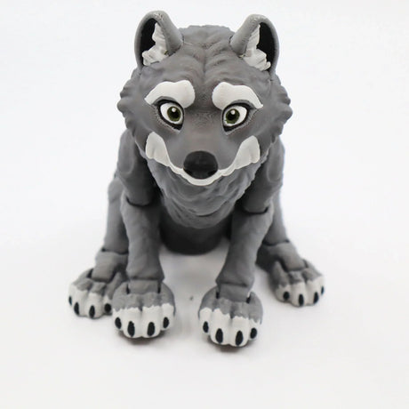 3D printed gray wolf sensory toy with articulated joints on a white background