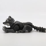 Gray 3D printed sensory wolf toy with articulated limbs on white background