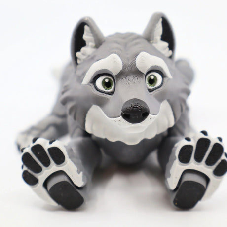 Cute gray wolf sensory toy with textured 3D details and playful expression, front view