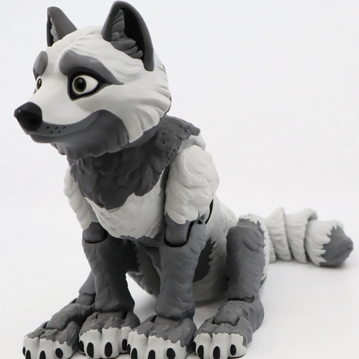 Gray and white 3D printed wolf sensory toy with articulated limbs on white background