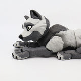 Gray and white 3D printed wolf sensory toy with movable joints on a white background