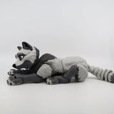 Gray 3D printed wolf sensory toy lying down, flexible and textured for tactile play