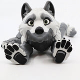 Cute gray and white 3D printed wolf sensory toy with large paws on white background