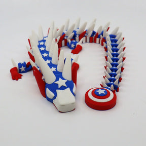 3D printed patriotic flexi dragon with stars, stripes, and shield for sensory play