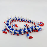 Red, white, and blue 3D printed flexi animal fidget toy with stars and shield, ideal for sensory play