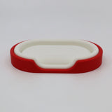 Red and white 3D printed sensory toy tray for children on white background