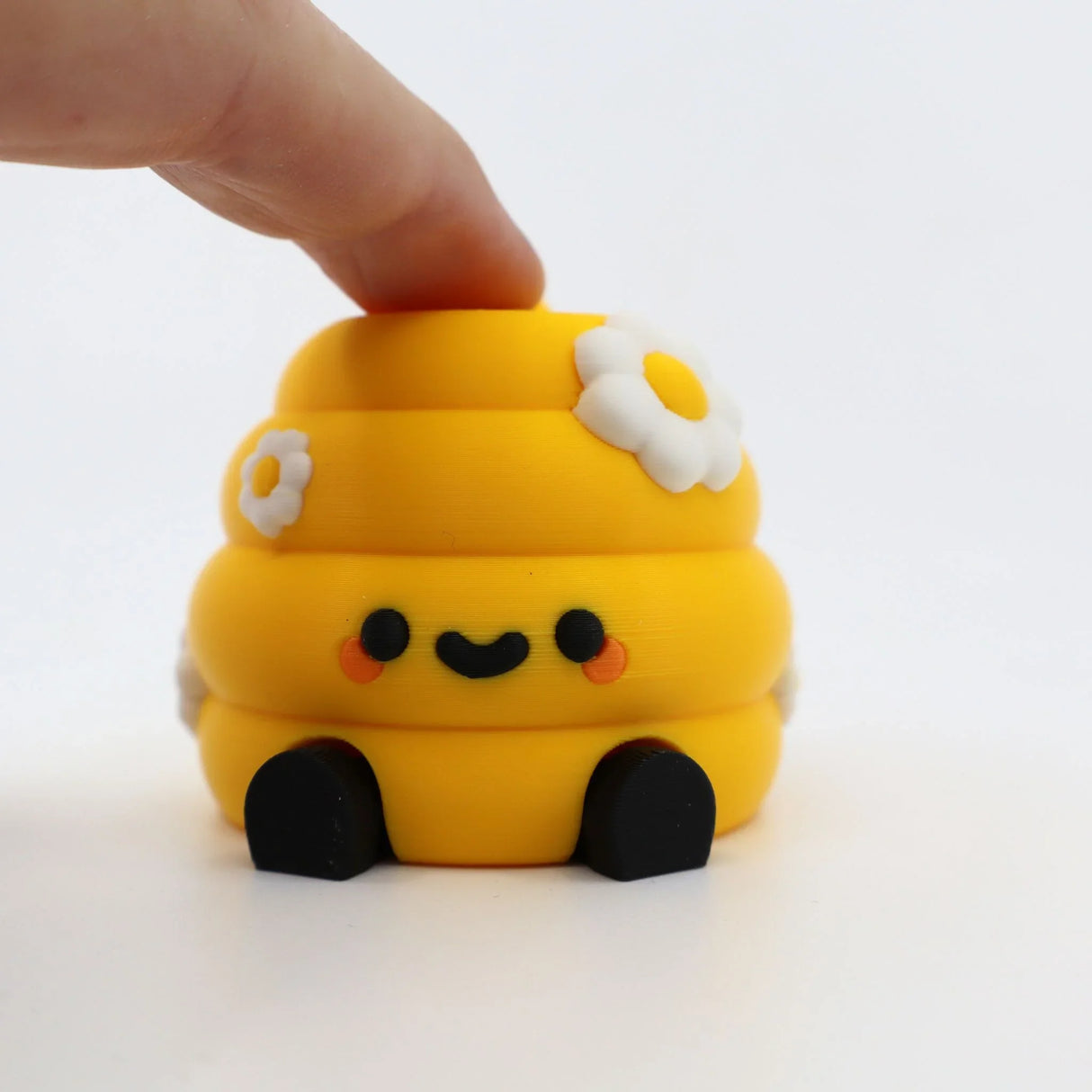Yellow 3D printed fidget toy with daisy details, perfect for sensory play and stress relief