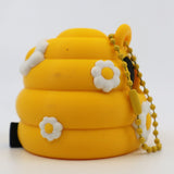 Yellow 3D printed fidget toy with daisy flowers and bead chain, sensory tool for kids