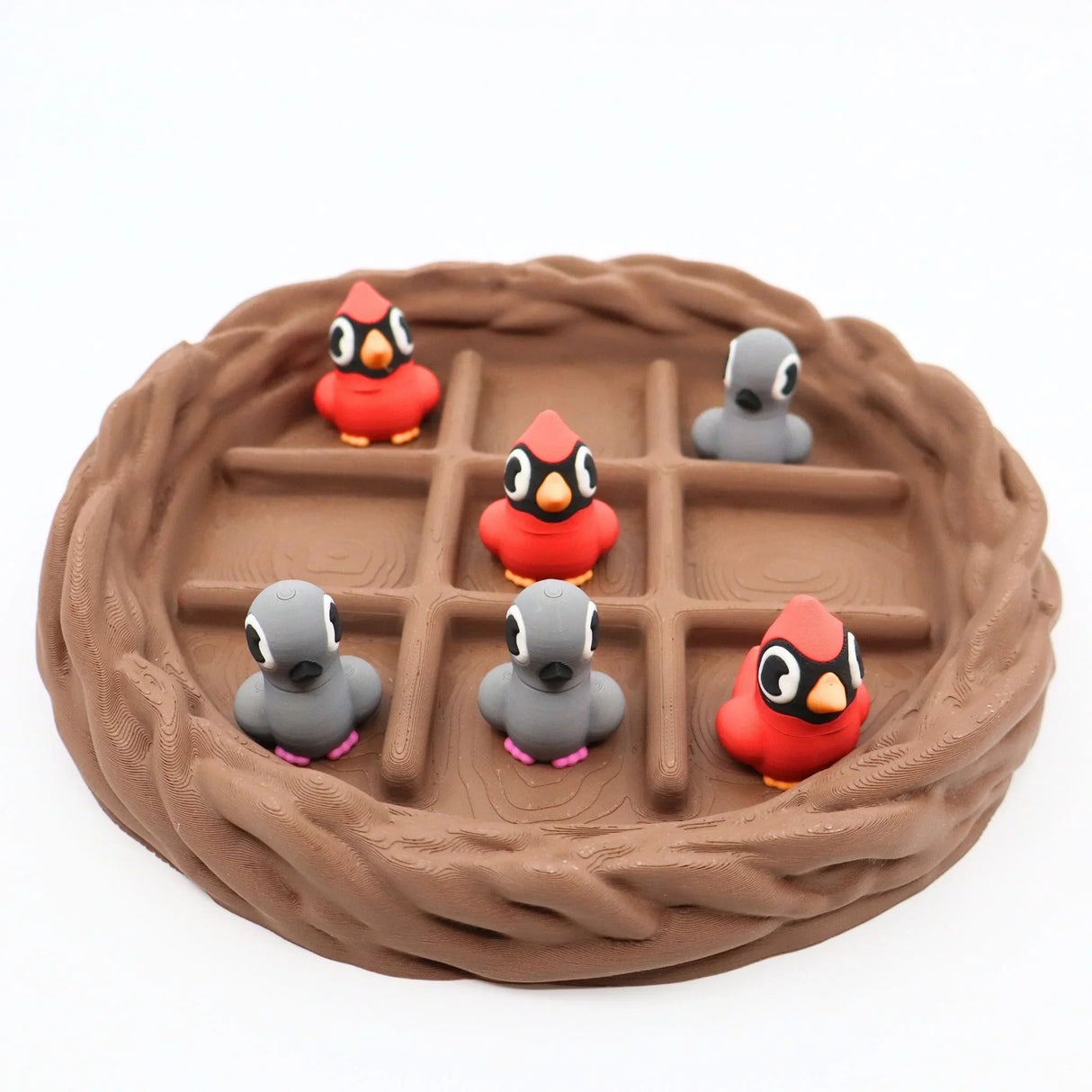 3D printed bird nest fidget toy with red and gray birds for sensory play and sorting