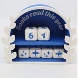 Blue and white sensory book tracker with counting cubes, labeled 'Books read this year'.