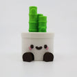 Cute 3D printed panda fidget toy with green bamboo, ideal for sensory play and education.