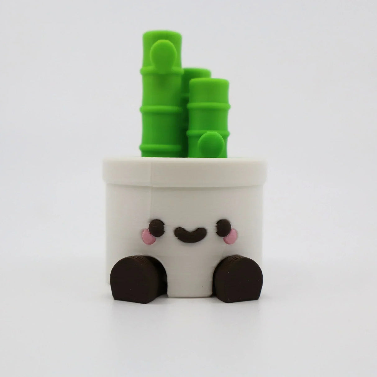 Cute 3D printed panda fidget toy with green bamboo, ideal for sensory play and education.