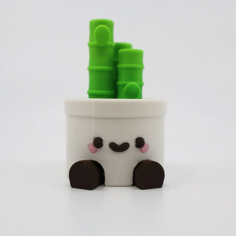 Cute 3D printed panda fidget toy with green bamboo, ideal for sensory play and education.