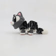 3D printed gray striped cat sensory toy with flexible joints on white background