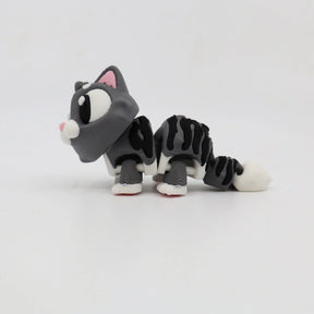 3D printed gray striped cat sensory toy with flexible joints on white background