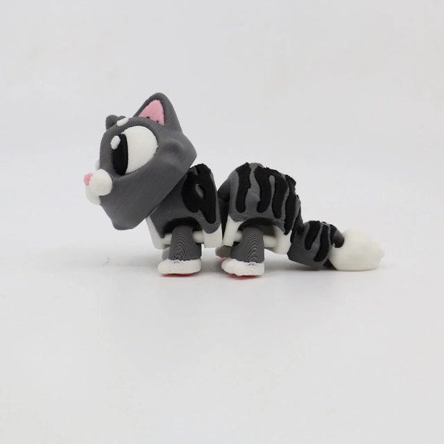 3D printed gray striped cat sensory toy with flexible joints on white background