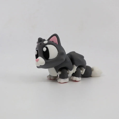 Gray and white 3D printed cat sensory toy with articulated legs on white background