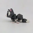 3D printed gray and white cat sensory toy with flexible joints on white background