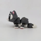 3D printed gray and white cat sensory toy with flexible joints on white background