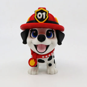 3D printed fire pup fidget toy with red helmet, blue eyes, and flame badge for sensory play