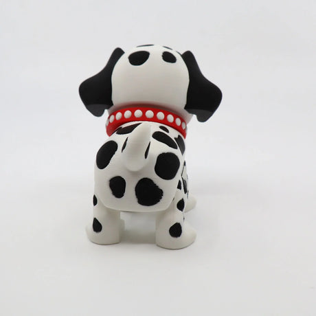 3D printed Dalmatian fidget toy with red collar, sensory-friendly design for kids