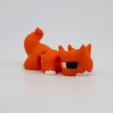 Orange 3D printed fox fidget toy with white paws and big eyes, sensory-friendly design for kids