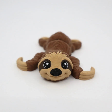 3D printed sloth sensory toy with cute face for children on white background