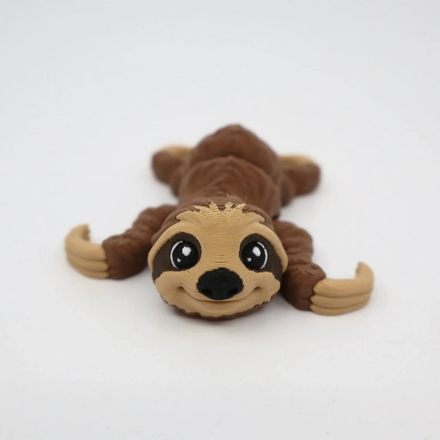3D printed sloth sensory toy with cute face for children on white background