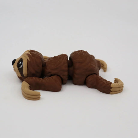 Brown 3D printed sloth sensory toy with jointed limbs on a white background