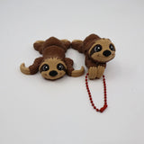 Two brown 3D printed sloth sensory fidget toys on white background, one with red bead chain.