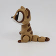 3D printed brown and beige sensory toy animal with large eyes on a white background