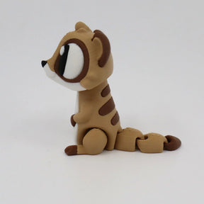 3D printed brown and beige sensory toy animal with large eyes on a white background