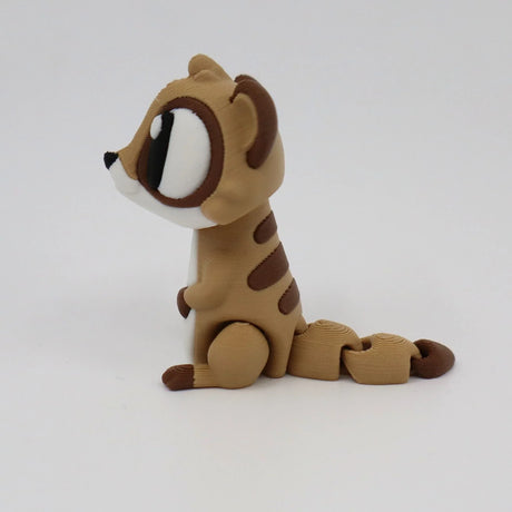 3D printed brown and beige sensory toy animal with large eyes on a white background