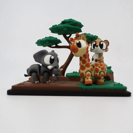 3D printed sensory toy featuring cartoon elephant, giraffe, and meerkat in a savanna scene