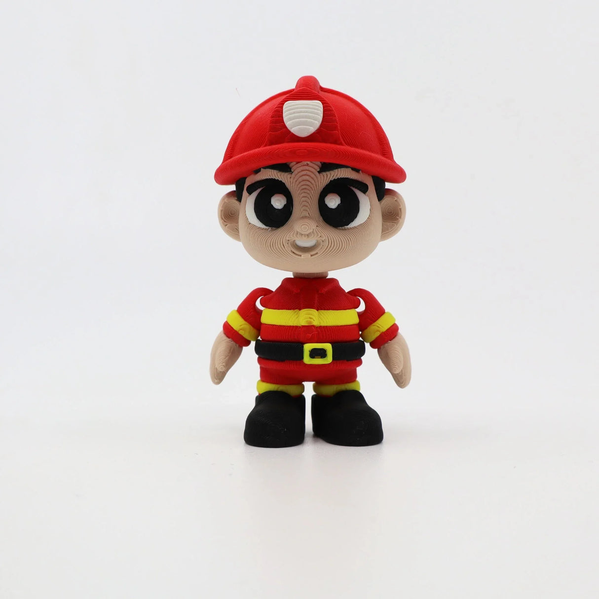 3D printed firefighter toy with red helmet, yellow stripes, sensory texture for kids