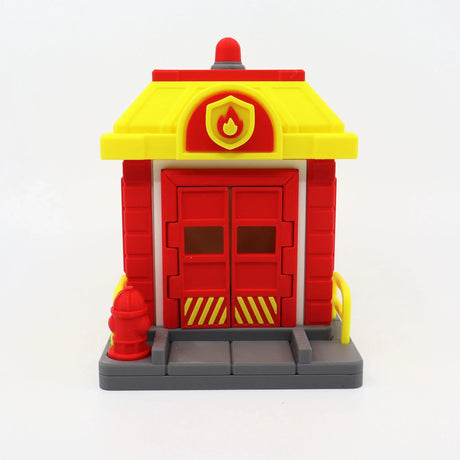 3D printed fire station toy with red doors, yellow roof, and sensory details for kids