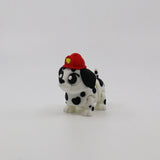 3D printed Dalmatian puppy fidget toy with red firefighter hat, sensory-friendly design for kids