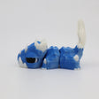 Blue and white 3D printed sensory toy dragon with spikes on a white background