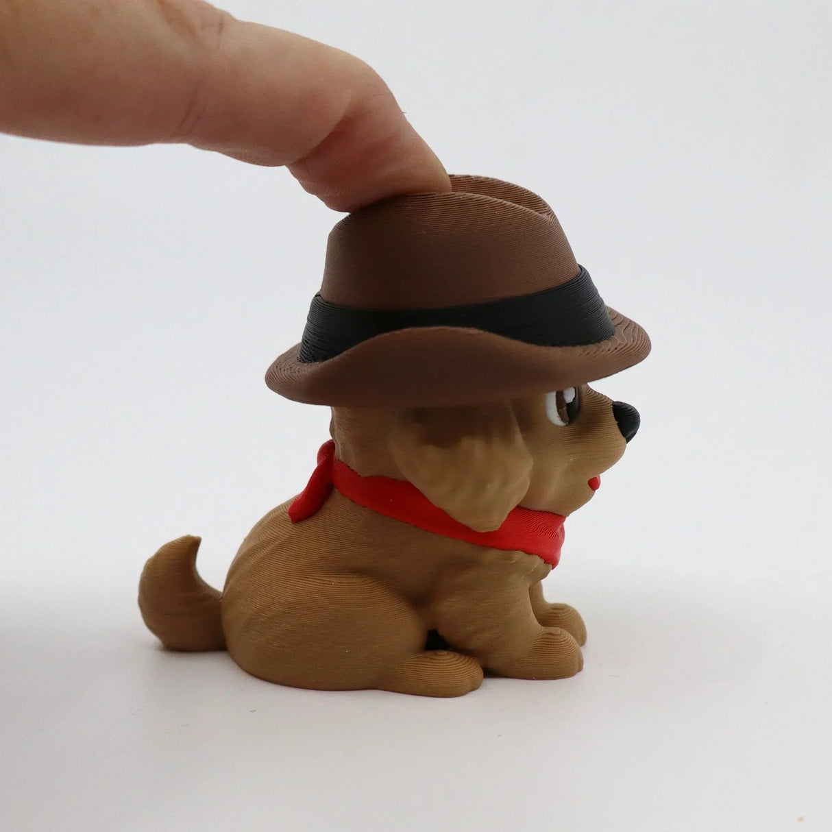 3D printed fidget dog toy with hat and scarf, sensory-friendly design for tactile play