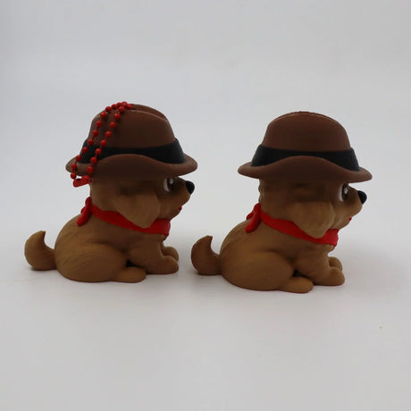 3D printed sensory dog toys with hats and red scarves for tactile play