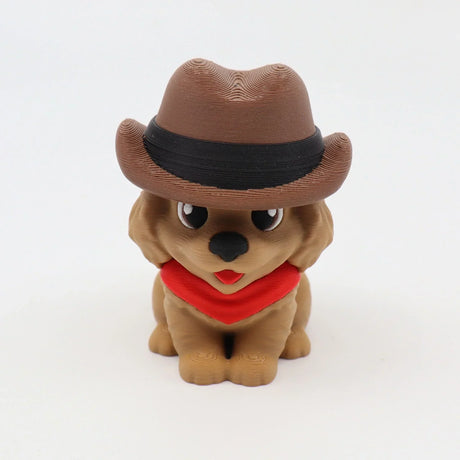 3D printed dog fidget toy with cowboy hat and red bandana, sensory friendly design for kids