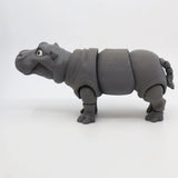 Gray 3D printed hippo sensory toy with movable joints on a white background
