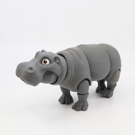 3D printed gray hippo sensory toy with articulated joints on a white background