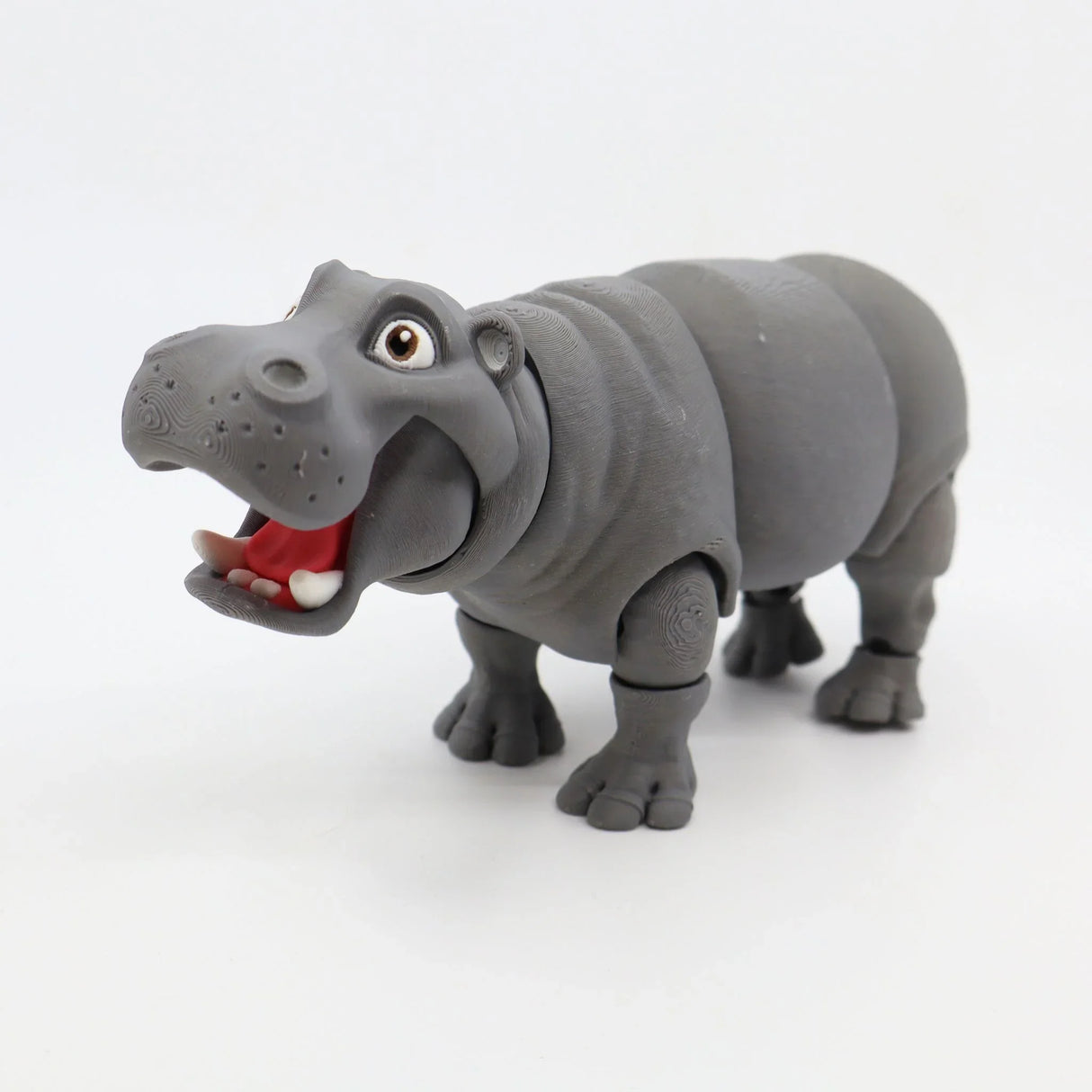 3D printed gray hippo sensory toy with articulated legs and open mouth on white background