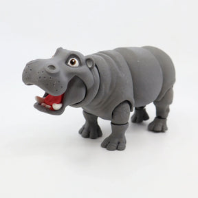 3D printed gray hippo sensory toy with articulated legs and open mouth on white background