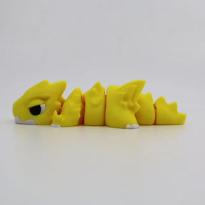 Yellow 3D printed flexi dragon fidget toy for sensory play and tactile stimulation