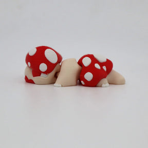 3D printed sensory toy turtle with red and white mushroom shell on white background