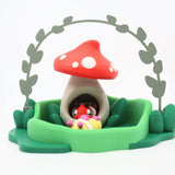 Cute 3D printed mushroom house sensory toy with whimsical animal figure for kids